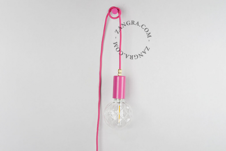 Pink plug-in pendant light with switch and plug.