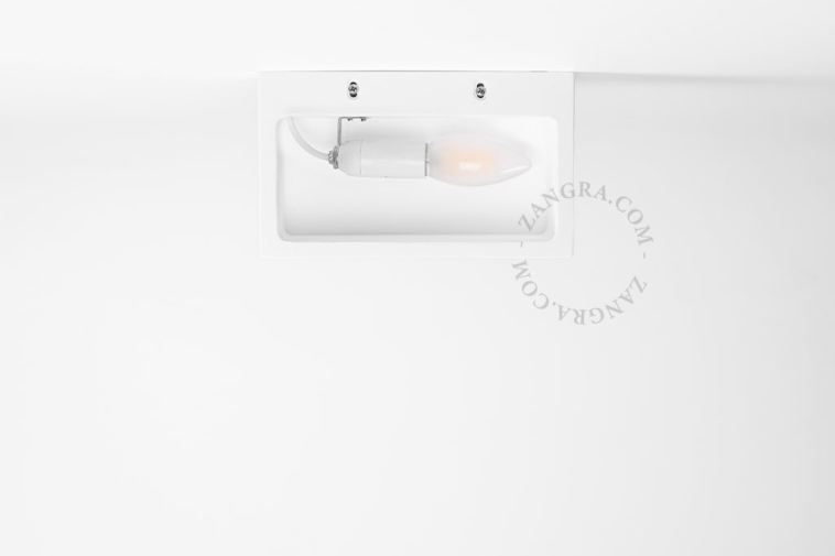 Paintable uplighter in plaster.