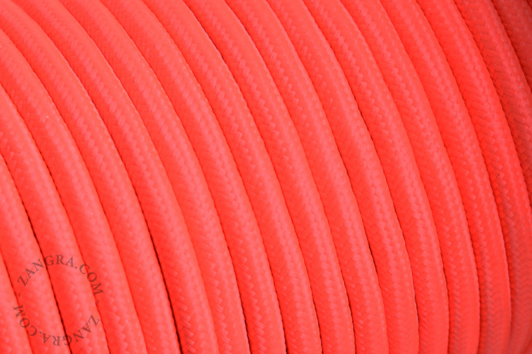 Fluorescent pink fabric cable.