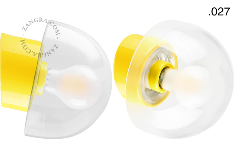 Yellow porcelain wall light with glass lampshade.
