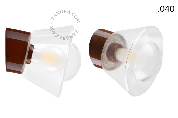 Brown porcelain wall light with glass lampshade.