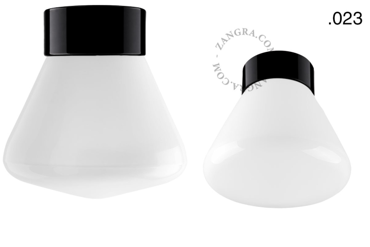 Zwarte porseleinen lamp met glazen schroefkap.