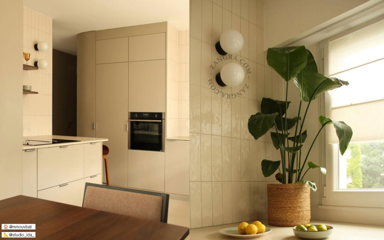 Black porcelain light fixture with glass globe.