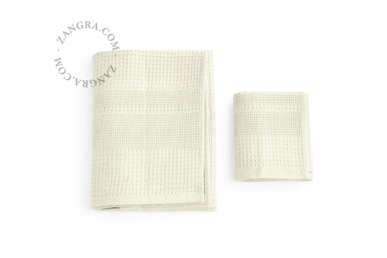 Beige honeycomb bath towel.