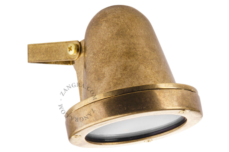 Raw brass small wall light for outdoor use or bathroom.
