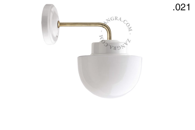 Retro white porcelain wall light with glass shade.