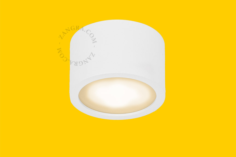 Surface-mounted spotlights for outdoor lighting.