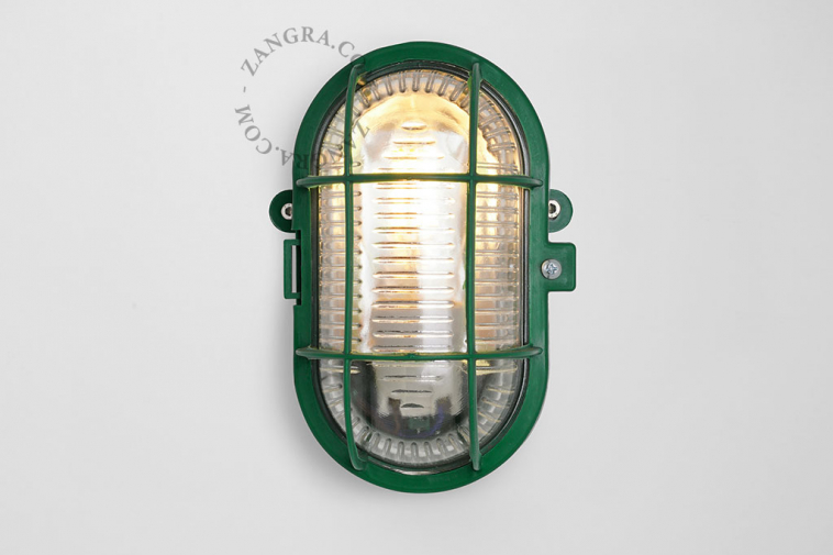 Green bulkhead light for bathroom or outdoor use.
