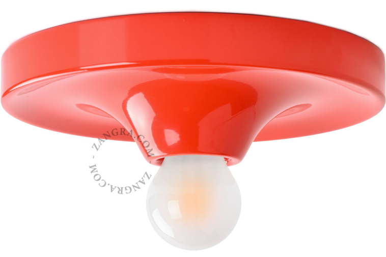 Rund rød lampe.