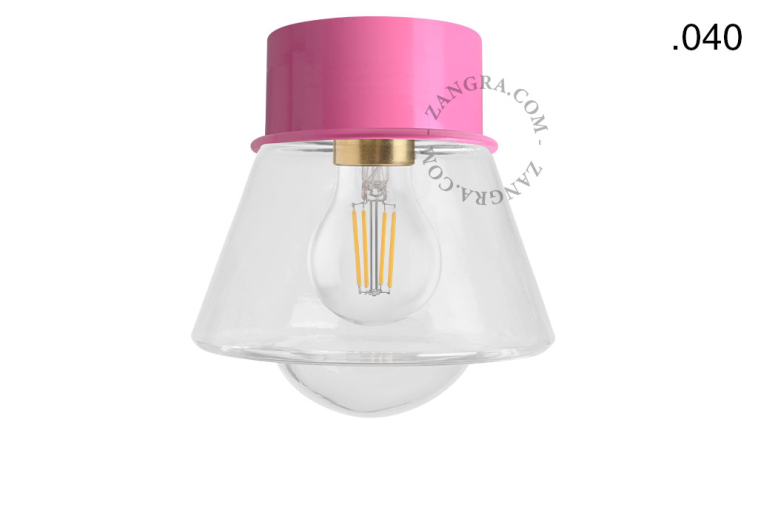 Pink ceiling light with glass shade.