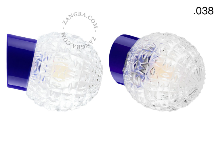 Blue porcelain wall light with glass lampshade.