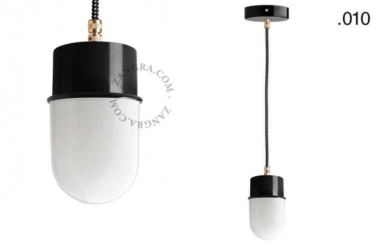 Black pendant light with glass shade.
