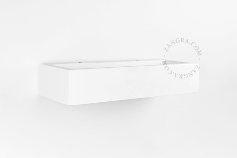 Paintable uplighter in plaster.