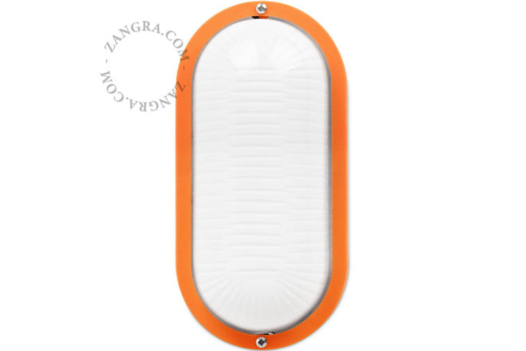 Oval orange bulkhead light.