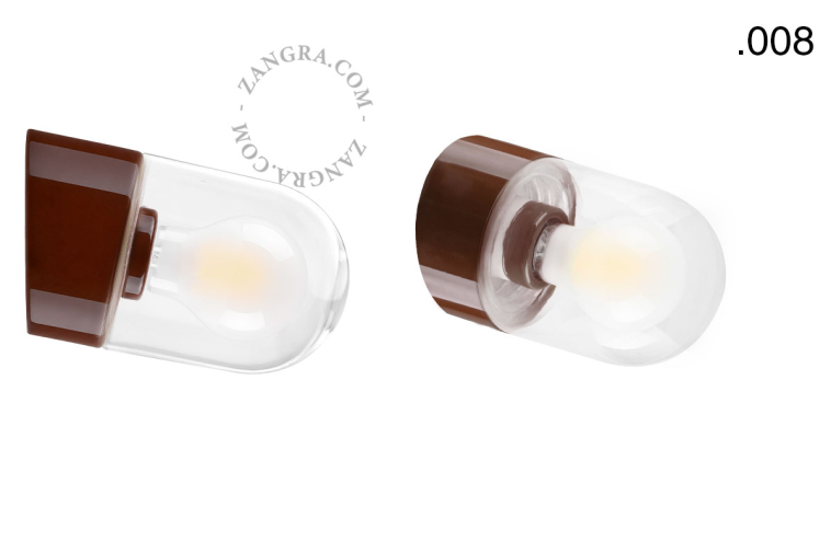 Brown porcelain wall light with glass lampshade.
