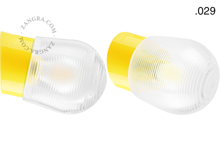 Yellow porcelain wall light with glass lampshade.