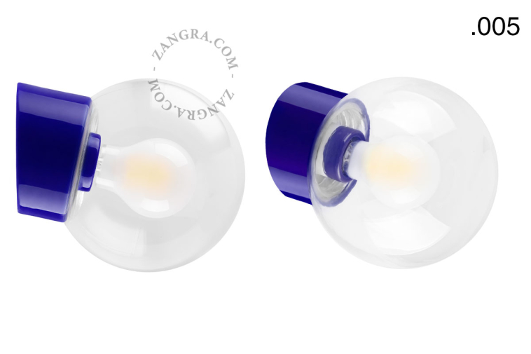 Blue porcelain wall light with glass lampshade.
